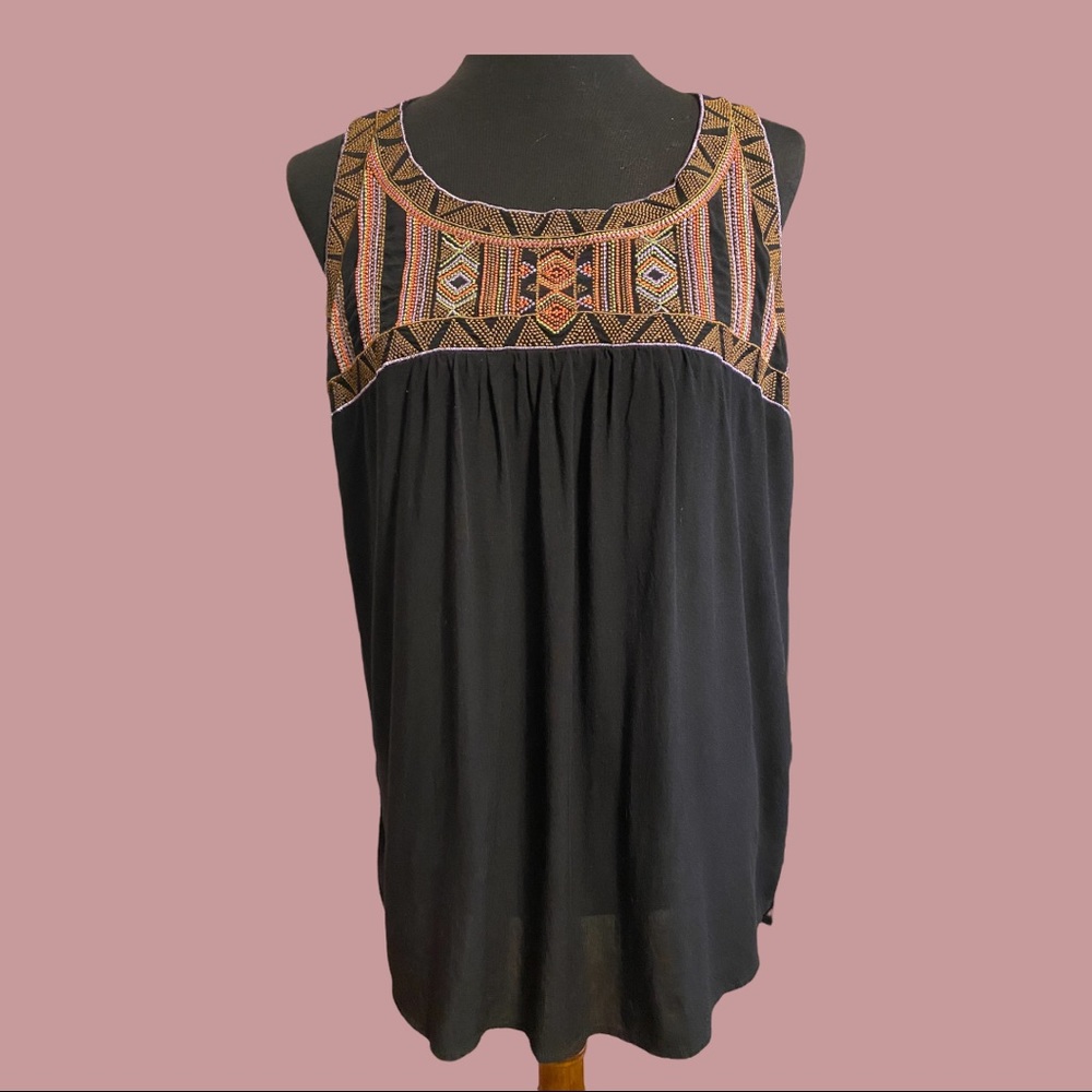 Sleeveless blouse for the summer or spring.
